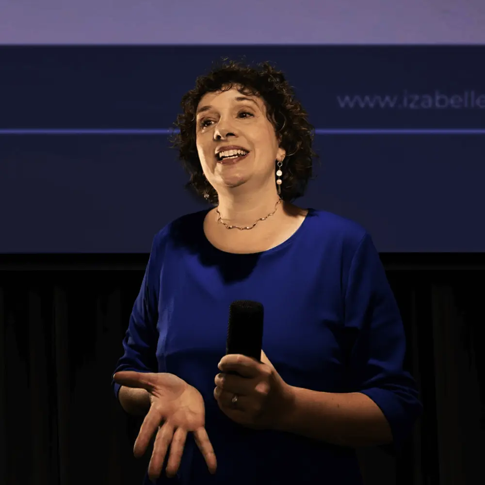Keynote speaker Dr. Izabelle Grenon at a corporate event.